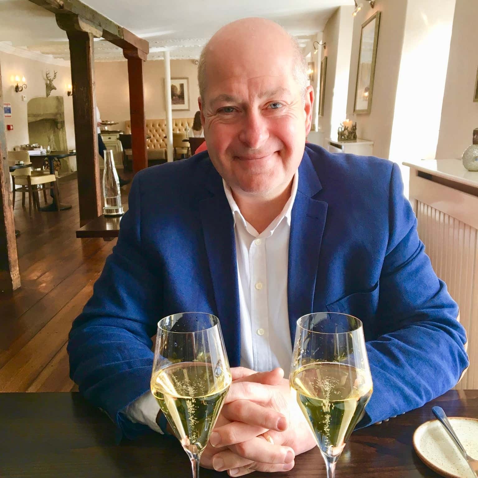 Mike Lawton with glasses of wine