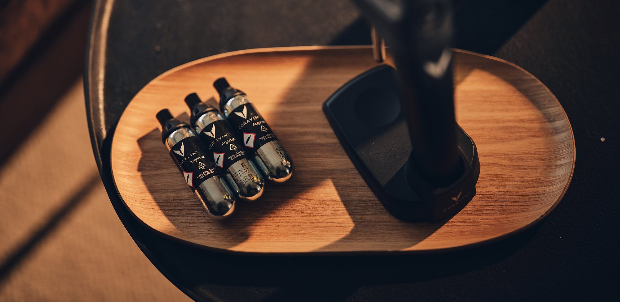 coravin timeless argon capsules on wooden tray