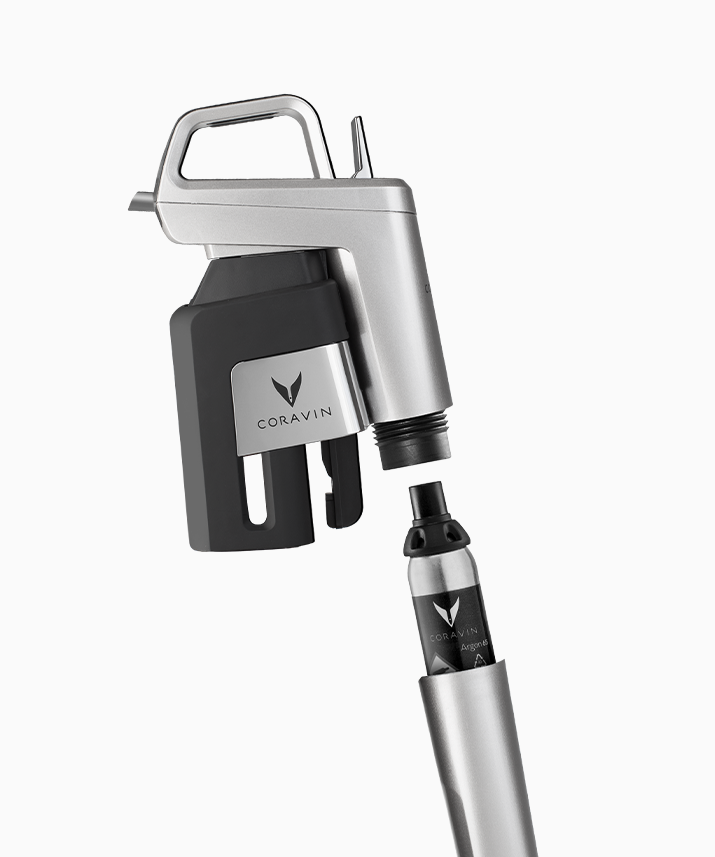 Coravin Silver Timeless Six inserting capsule into cup