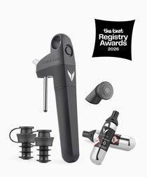 The image shows a black Pivot+ Wine by-the-Glass System, including a Pivot Aerator, a wine bottle stopper, and two argon capsules; with a badge indicating selection by The Knot Registry Awards