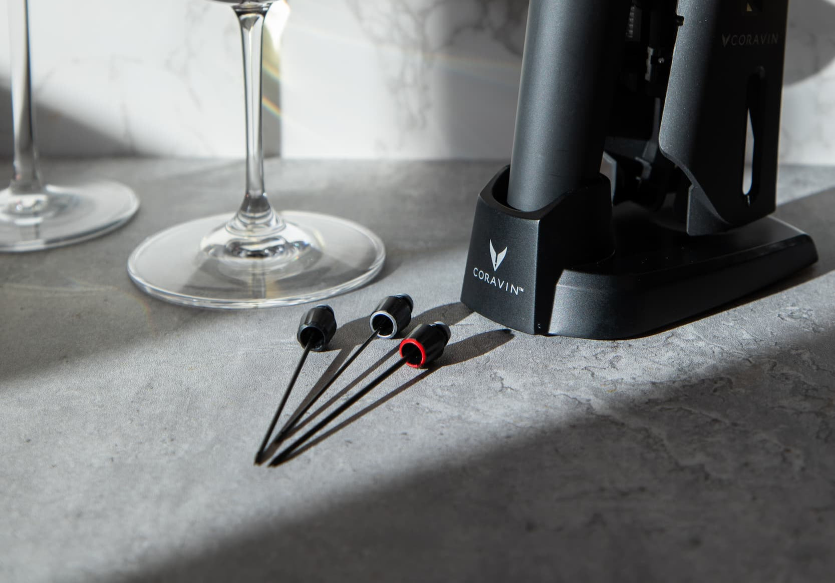 three coravin wine saver needles and wine by the glass system